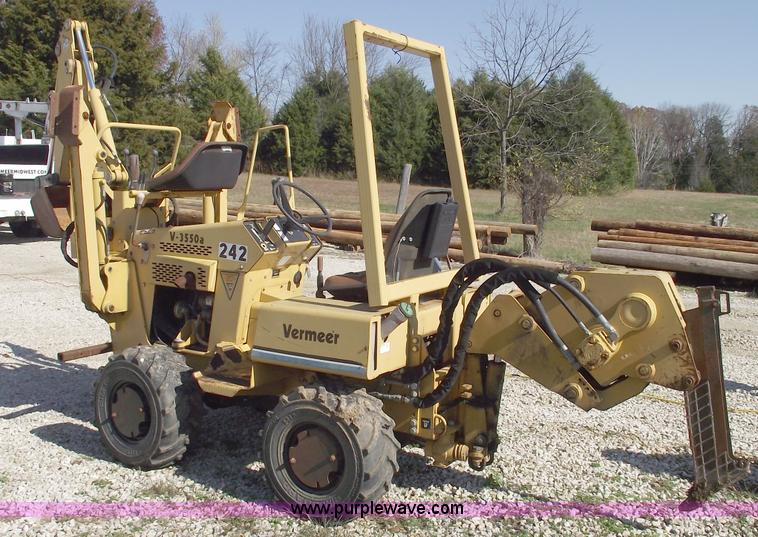 image for item C5754 Vermeer V3550A vibratory plow with backhoe