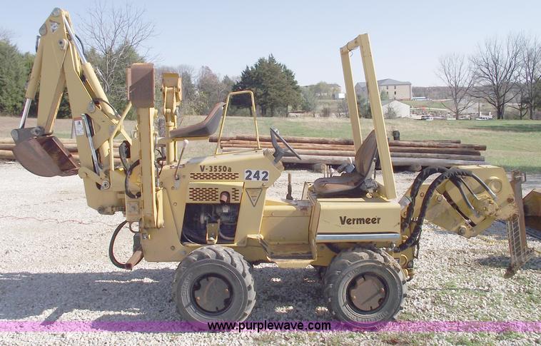 image for item C5754 Vermeer V3550A vibratory plow with backhoe