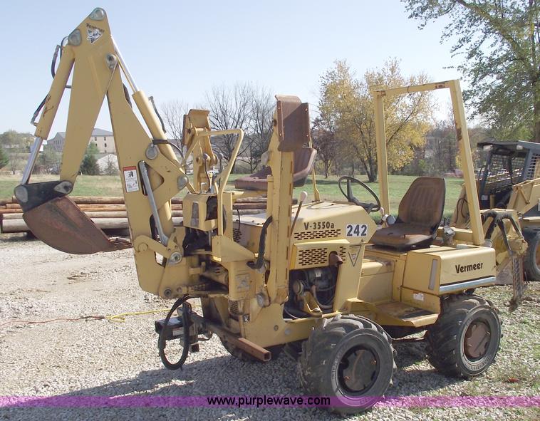 image for item C5754 Vermeer V3550A vibratory plow with backhoe