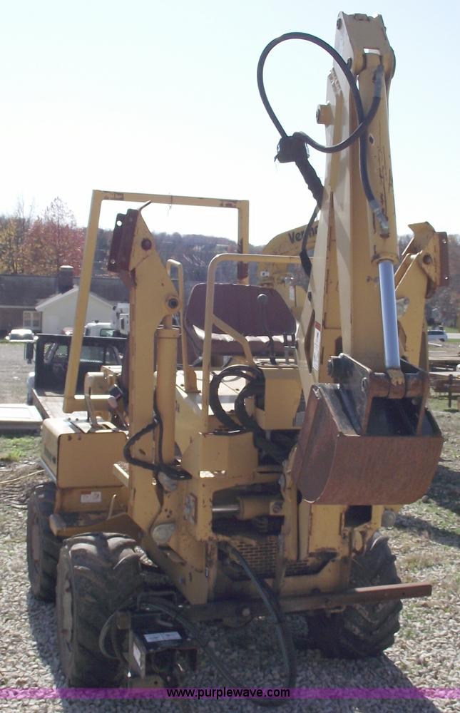 image for item C5754 Vermeer V3550A vibratory plow with backhoe