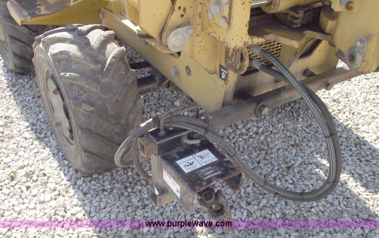 image for item C5754 Vermeer V3550A vibratory plow with backhoe