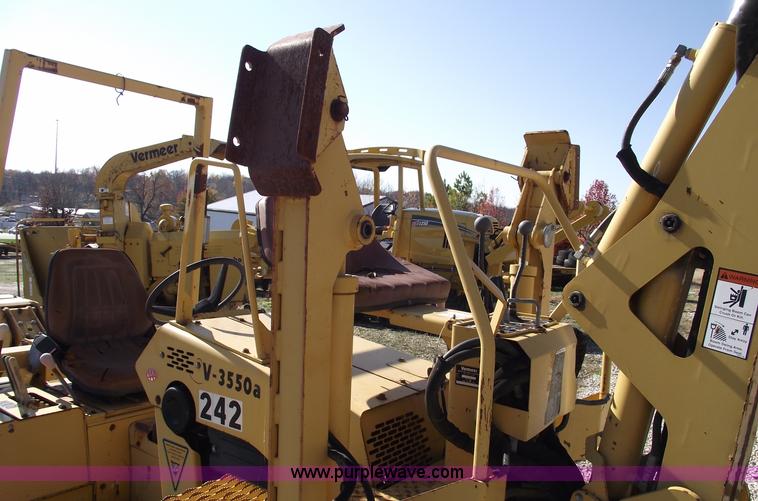 image for item C5754 Vermeer V3550A vibratory plow with backhoe