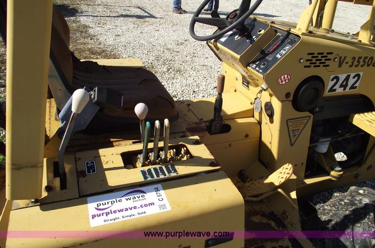 image for item C5754 Vermeer V3550A vibratory plow with backhoe