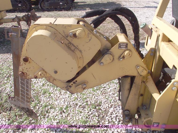 image for item C5754 Vermeer V3550A vibratory plow with backhoe