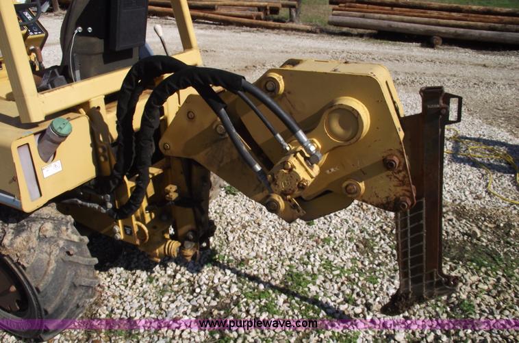 image for item C5754 Vermeer V3550A vibratory plow with backhoe