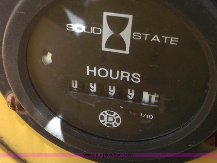 image for item C5754 Vermeer V3550A vibratory plow with backhoe