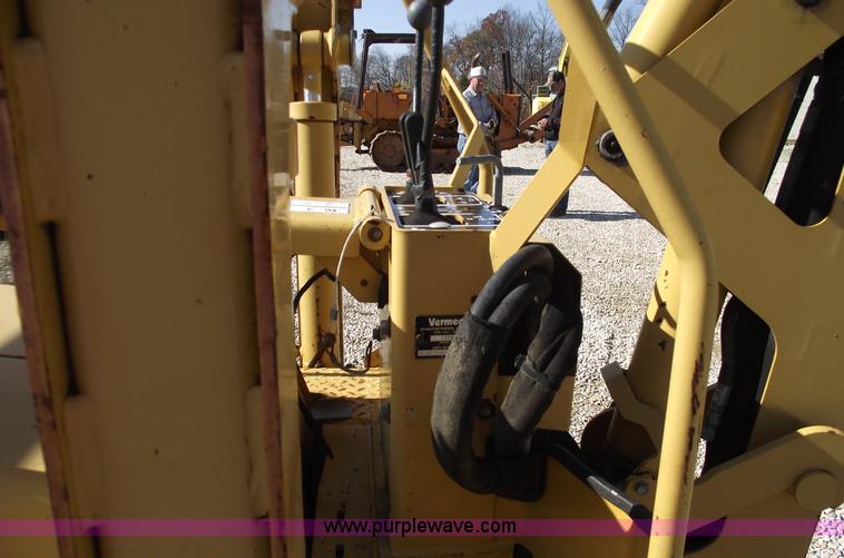 image for item C5754 Vermeer V3550A vibratory plow with backhoe