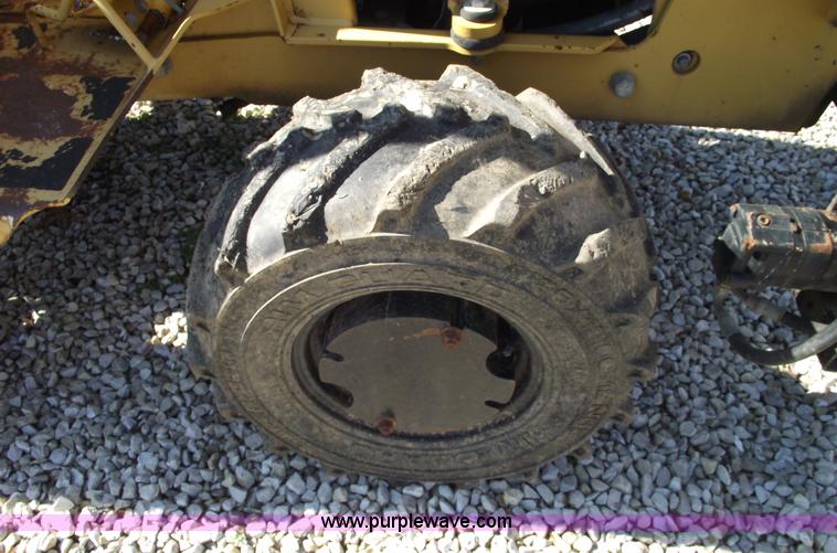 image for item C5754 Vermeer V3550A vibratory plow with backhoe