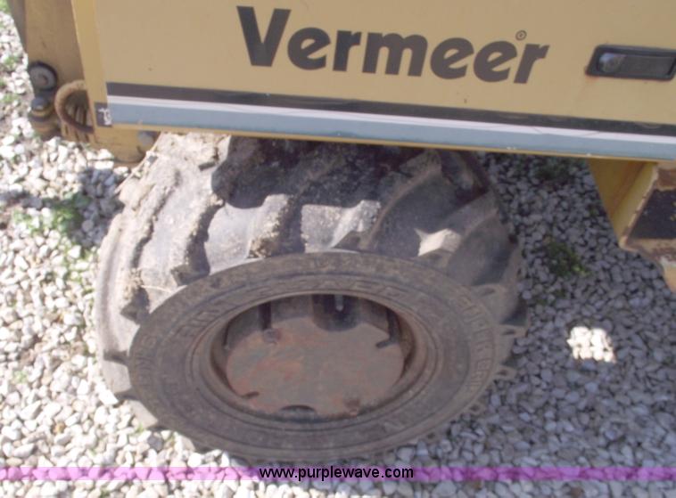 image for item C5754 Vermeer V3550A vibratory plow with backhoe