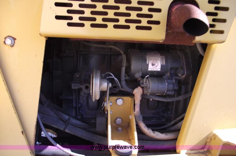 image for item C5754 Vermeer V3550A vibratory plow with backhoe