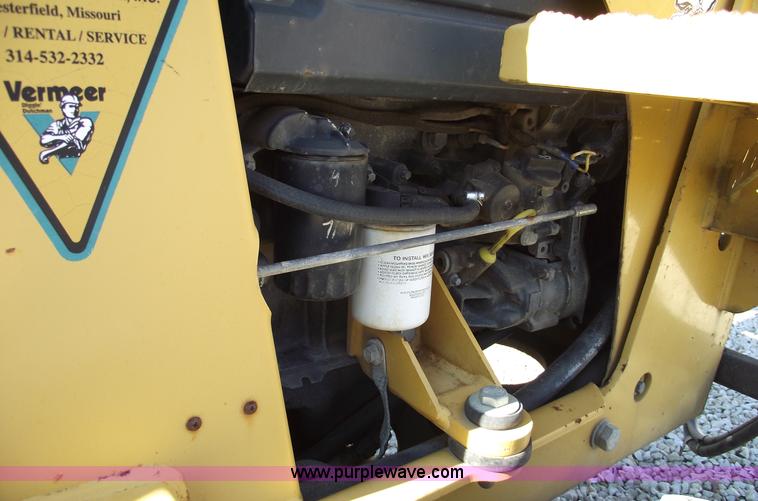 image for item C5754 Vermeer V3550A vibratory plow with backhoe