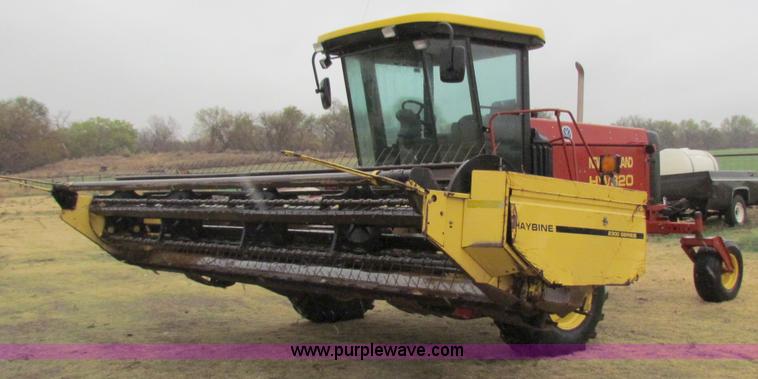 image for item A3511 2000 New Holland HW320 self propelled swather