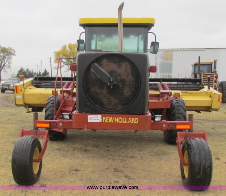 image for item A3511 2000 New Holland HW320 self propelled swather