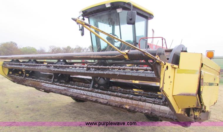 image for item A3511 2000 New Holland HW320 self propelled swather