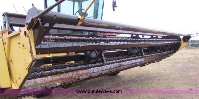 image for item A3511 2000 New Holland HW320 self propelled swather