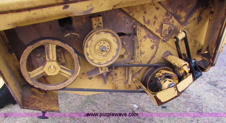 image for item A3511 2000 New Holland HW320 self propelled swather