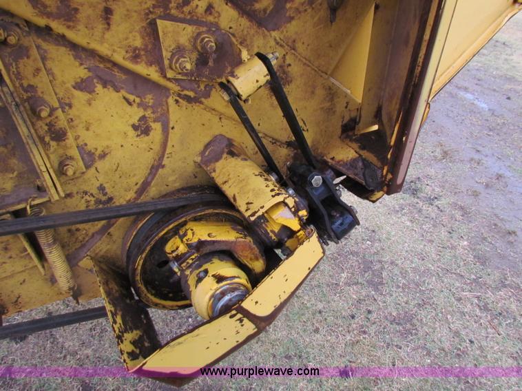 image for item A3511 2000 New Holland HW320 self propelled swather