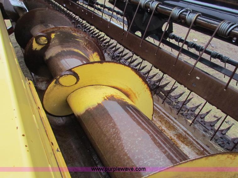 image for item A3511 2000 New Holland HW320 self propelled swather