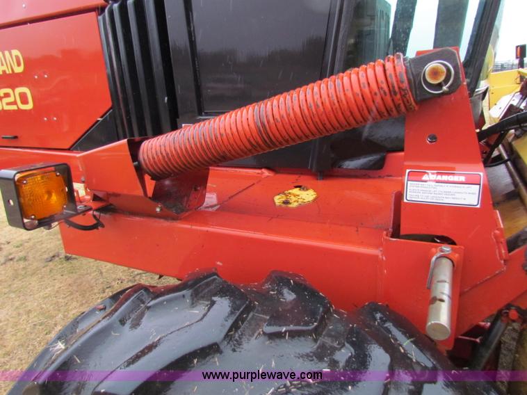 image for item A3511 2000 New Holland HW320 self propelled swather