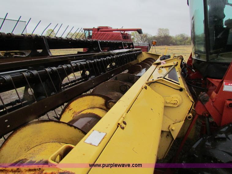 image for item A3511 2000 New Holland HW320 self propelled swather