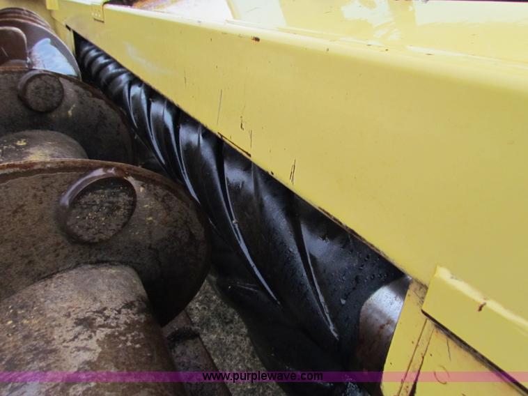 image for item A3511 2000 New Holland HW320 self propelled swather