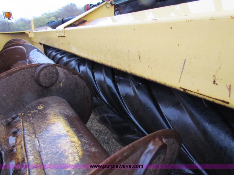 image for item A3511 2000 New Holland HW320 self propelled swather