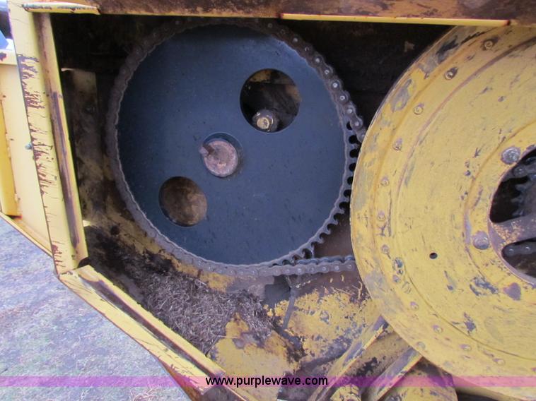 image for item A3511 2000 New Holland HW320 self propelled swather