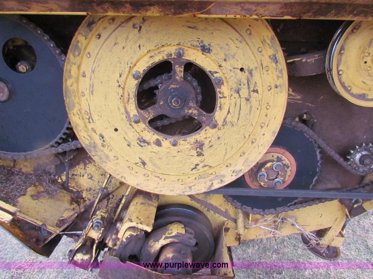 image for item A3511 2000 New Holland HW320 self propelled swather