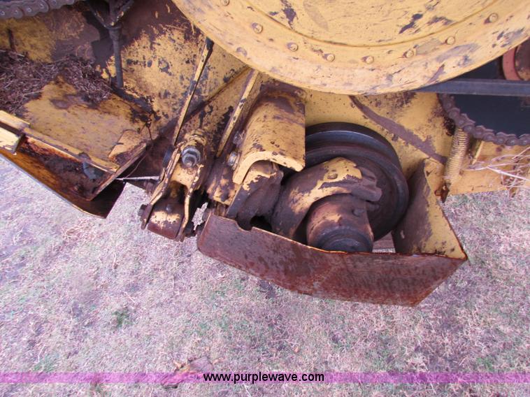 image for item A3511 2000 New Holland HW320 self propelled swather