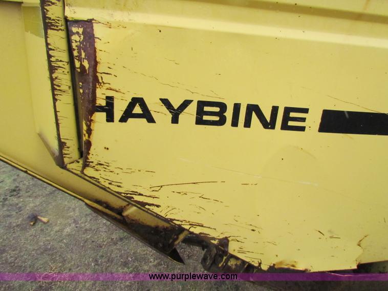 image for item A3511 2000 New Holland HW320 self propelled swather