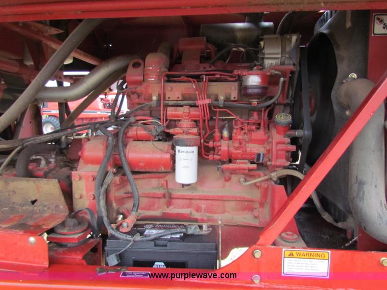 image for item A3511 2000 New Holland HW320 self propelled swather