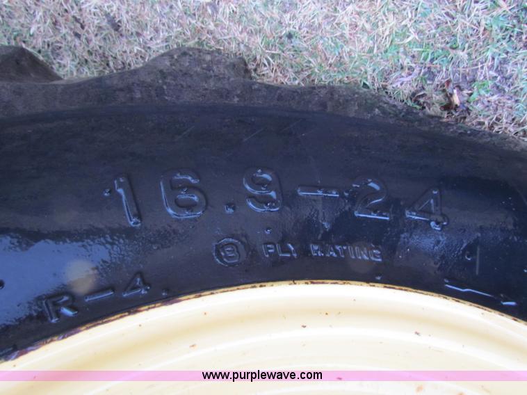 image for item A3511 2000 New Holland HW320 self propelled swather