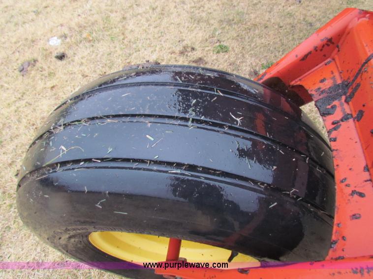 image for item A3511 2000 New Holland HW320 self propelled swather