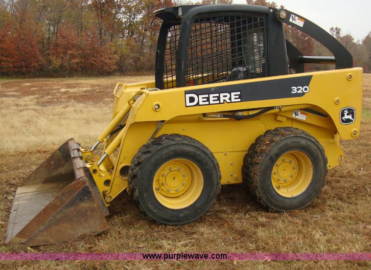 image for item A5163 2005 John Deere 320 skid loader