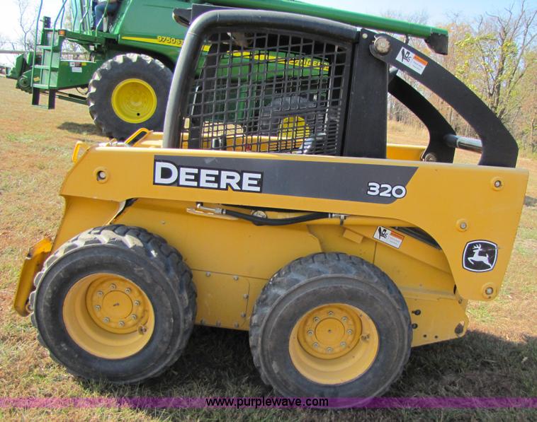 image for item A5163 2005 John Deere 320 skid loader