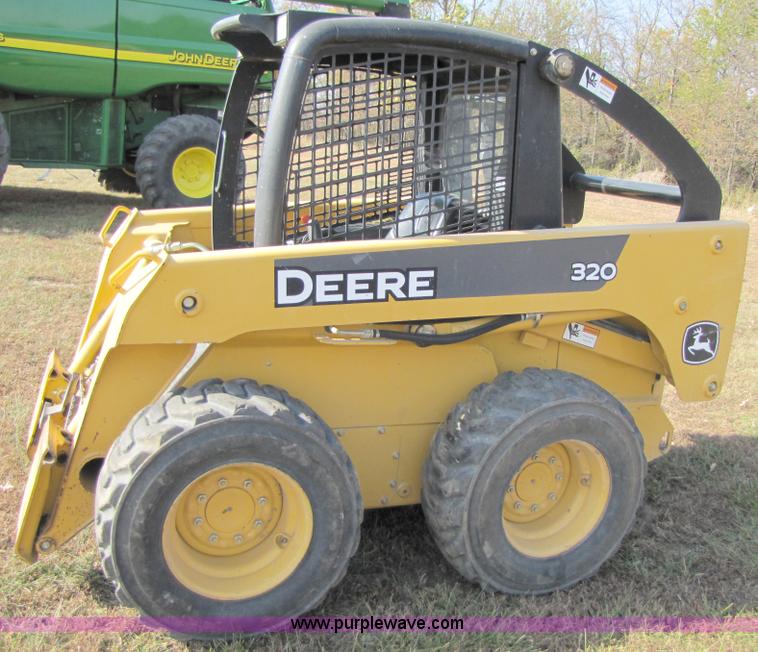 image for item A5163 2005 John Deere 320 skid loader