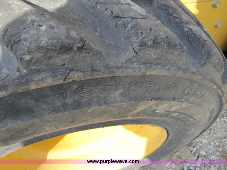 image for item A5163 2005 John Deere 320 skid loader