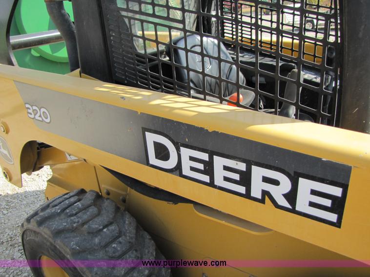 image for item A5163 2005 John Deere 320 skid loader
