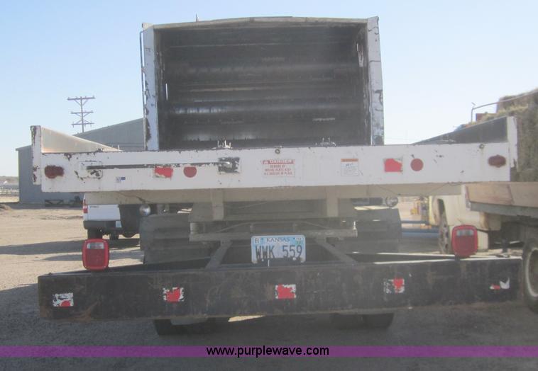 image for item B5534 1983 Ford LN800 bale feeder