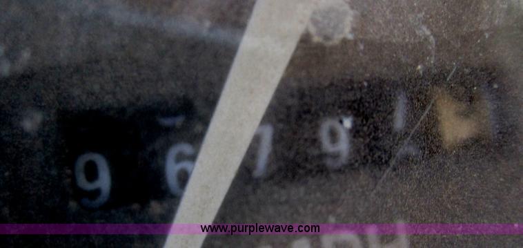 image for item B5534 1983 Ford LN800 bale feeder