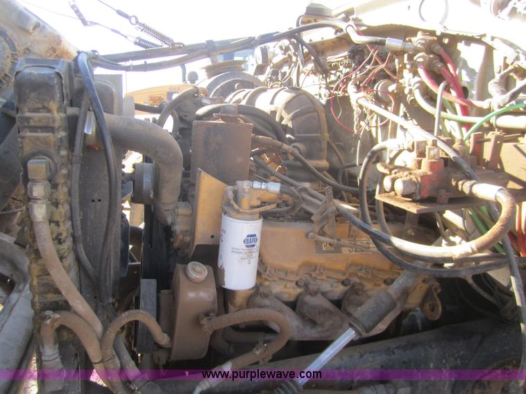 image for item B5534 1983 Ford LN800 bale feeder