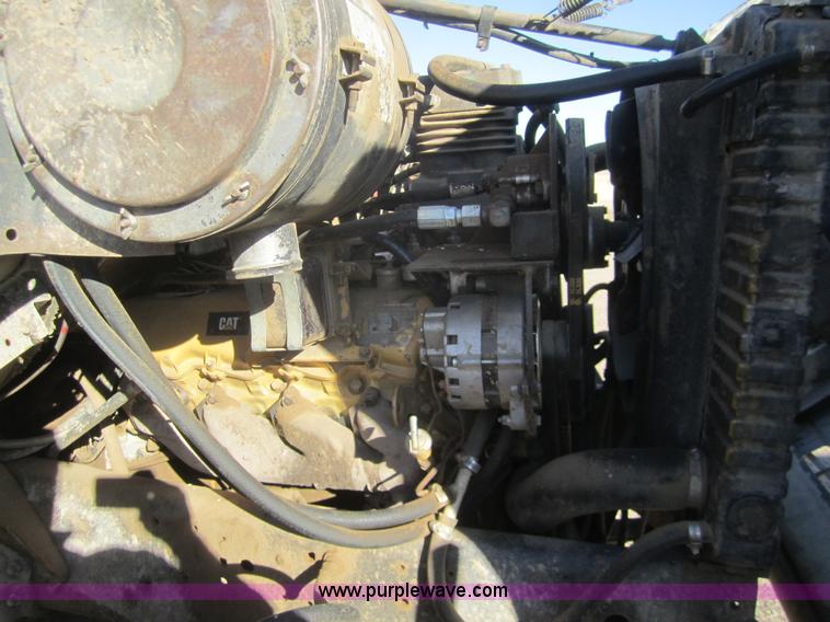 image for item B5534 1983 Ford LN800 bale feeder