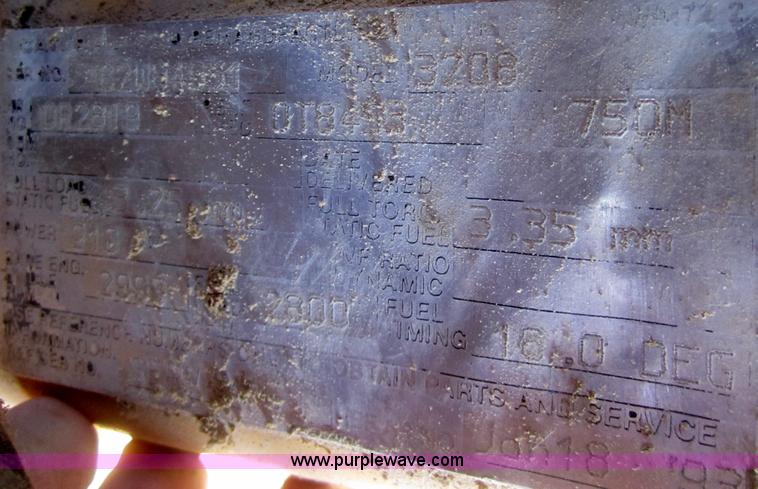 image for item B5534 1983 Ford LN800 bale feeder