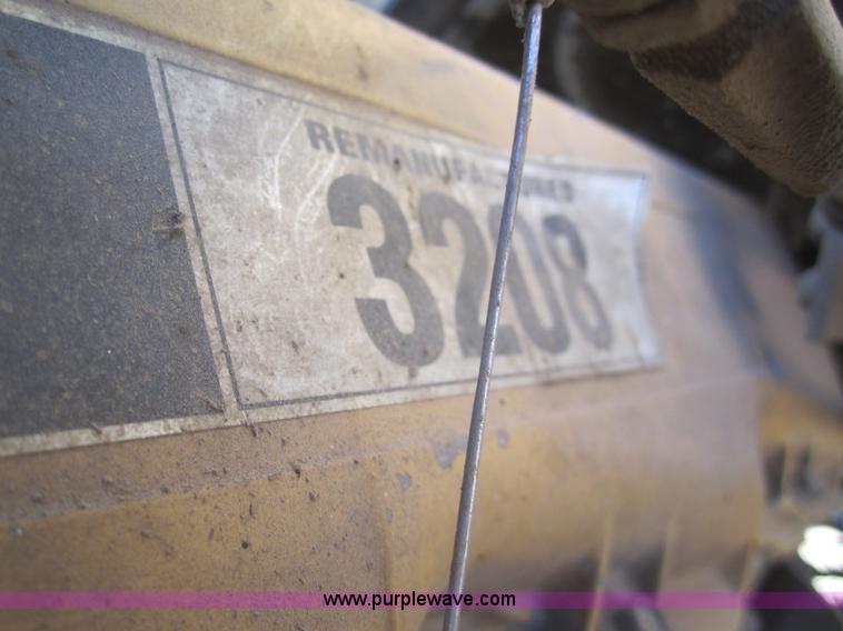 image for item B5534 1983 Ford LN800 bale feeder