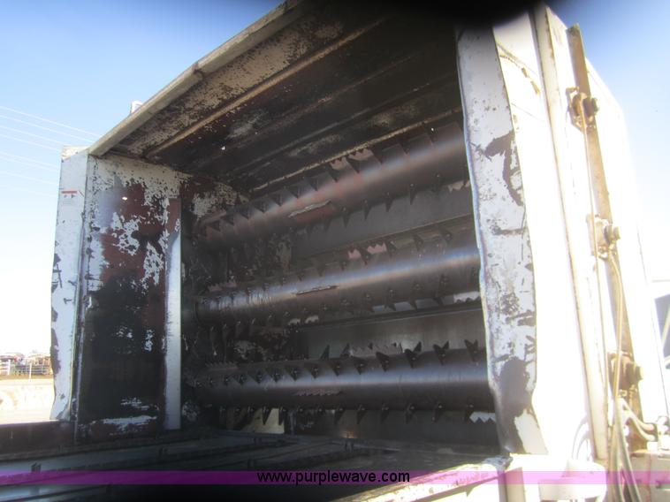 image for item B5534 1983 Ford LN800 bale feeder