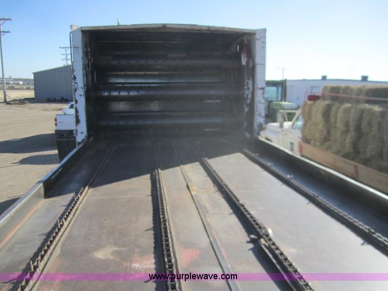 image for item B5534 1983 Ford LN800 bale feeder