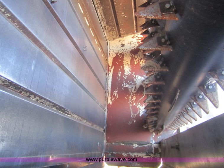 image for item B5534 1983 Ford LN800 bale feeder