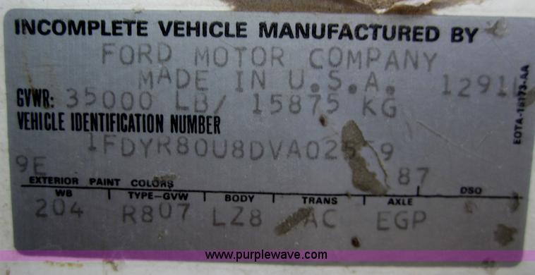 image for item B5534 1983 Ford LN800 bale feeder