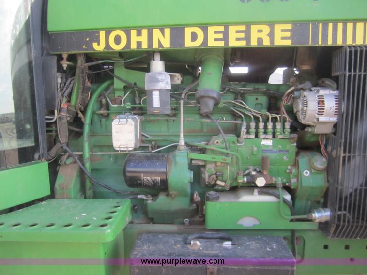image for item B5549 1990 John Deere 4555 MFWD tractor