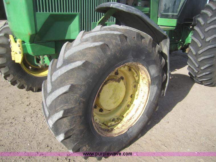 image for item B5549 1990 John Deere 4555 MFWD tractor